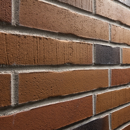 Клинкерная фасадная плитка Stroeher Handstrich 391 OCKERERZ для стильного и долговечного фасада
